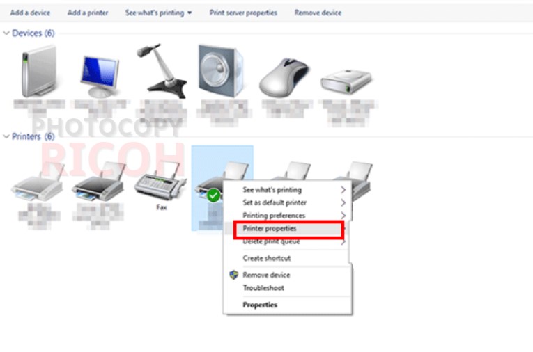 Cách tìm địa chỉ IP của máy photocopy Ricoh trên máy tính: click chuột phải vào máy photo bạn cần, rồi chọn "Printer Properties"